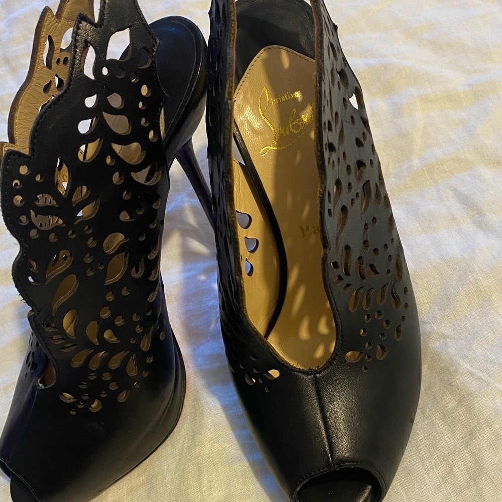 Beautiful christian louboutin heels. Bought them too small.
